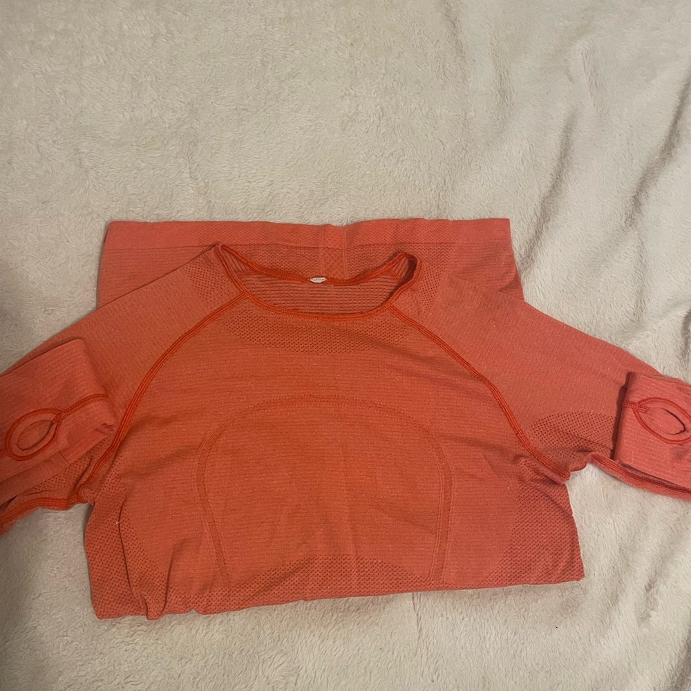 Orange lululemon discontinued top